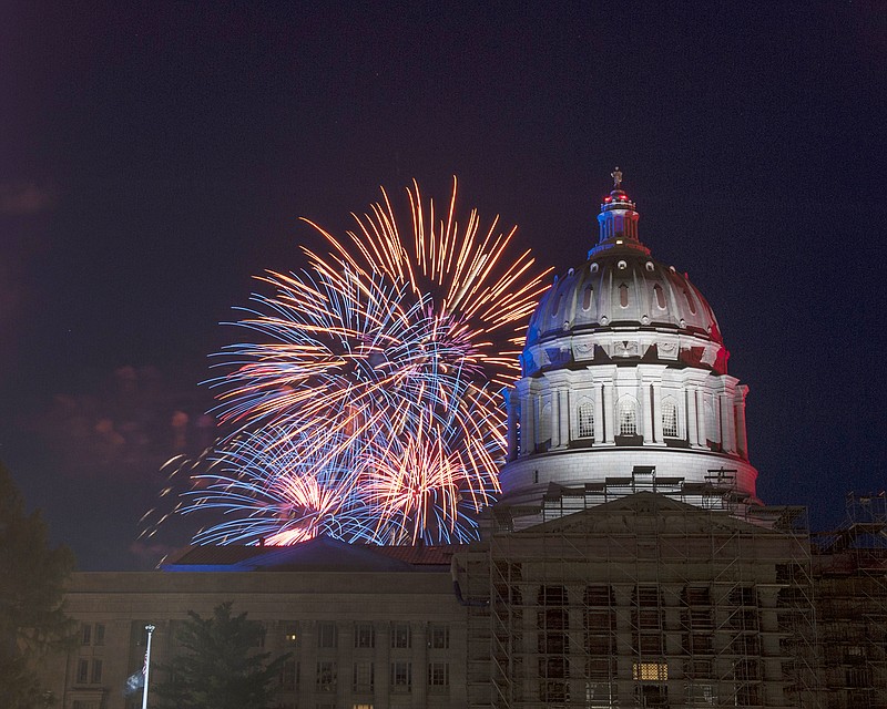 The Salute to America Red, White and Boom Fireworks Sky Concert illuminates the sky Wednesday behind the state Capitol.