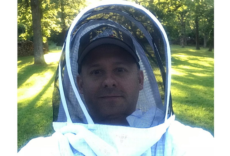 First-year beekeeper Aaron Larimore says he has been greatly aided by his fellow Show Me Beekeepers in establishing his hives this spring. He hopes to one day use this knowledge to open a pollination service.