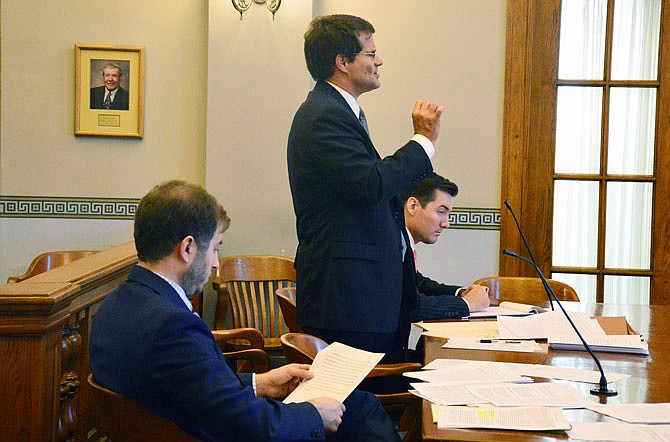 Matt Vianello, foreground, John Sauer and Daniel Hartman on Thursday debate the case challenging the governor's authority to appoint someone to fill a vacancy in the lieutenant governor's office.
