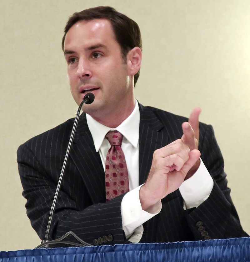 In this Thursday, July 5, 2018, photo, Joshua Svaty, a Democratic candidate for Kansas governor, makes a point during a forum in Topeka, Kan. Svaty is a former state agriculture secretary whose bid has been complicated by his past anti-abortion voting record as a legislator and abortion-rights' supporters becoming riled up by the retirement of U.S. Supreme Court Justice Anthony Kennedy. (AP Photo/John Hanna)