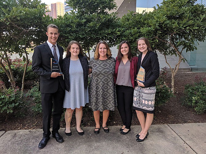 Recent Fulton High School grad Gabe Luebbert, sophomores Paige Key, McLachlan and Ellie McCray, and senior Heidi Royer senior pose for a photo at the FBLA conference in Baltimore, Maryland.