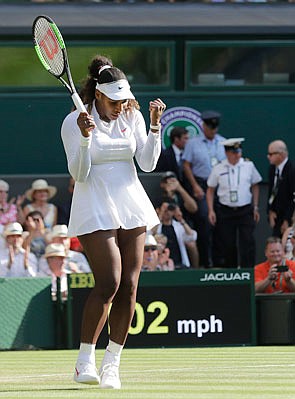 Serena Williams celebrates after Friday's win against Kristina Mladenovic at Wimbledon in London.