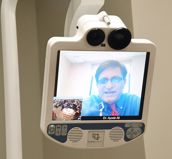 
In this Feb. 26, 2018 file photo, Dr. Ayoob Ali can be seen on screen of the telemedicine equipment demonstrated during a ribbon-cutting ceremony at St. Mary's Hospital in Jefferson City. Ali is a doctor at Cardinal Glennon Children's Hospital in St. Louis and helped with the equipment demonstration in the hospital's conference room. 