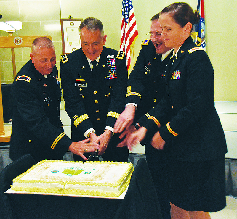 Maj. Gen. Steve Danner leads the traditional cake cutting at the celebration.