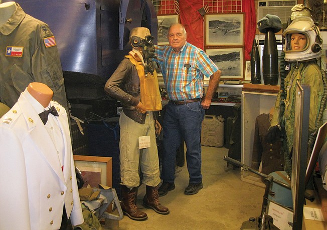 Ronnie Turner, proprietor of Turner's Army Surplus store in Leary, Texas, stands in his American Military History Museum at the store. Turner will celebrate the store's 65th anniversary July 21.
