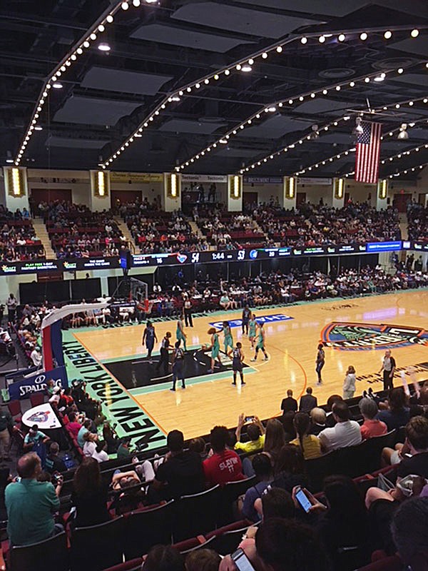 In this May 26 file photo, the Liberty and the Lynx play in a WNBA game at the Westchester County Center in White Plains, N.Y. Sometimes bigger isn't necessarily better, the WNBA is learning as far as arenas go. Teams have been going with smaller venues the last few years, allowing them to save money and create a more intimate experience for fans.