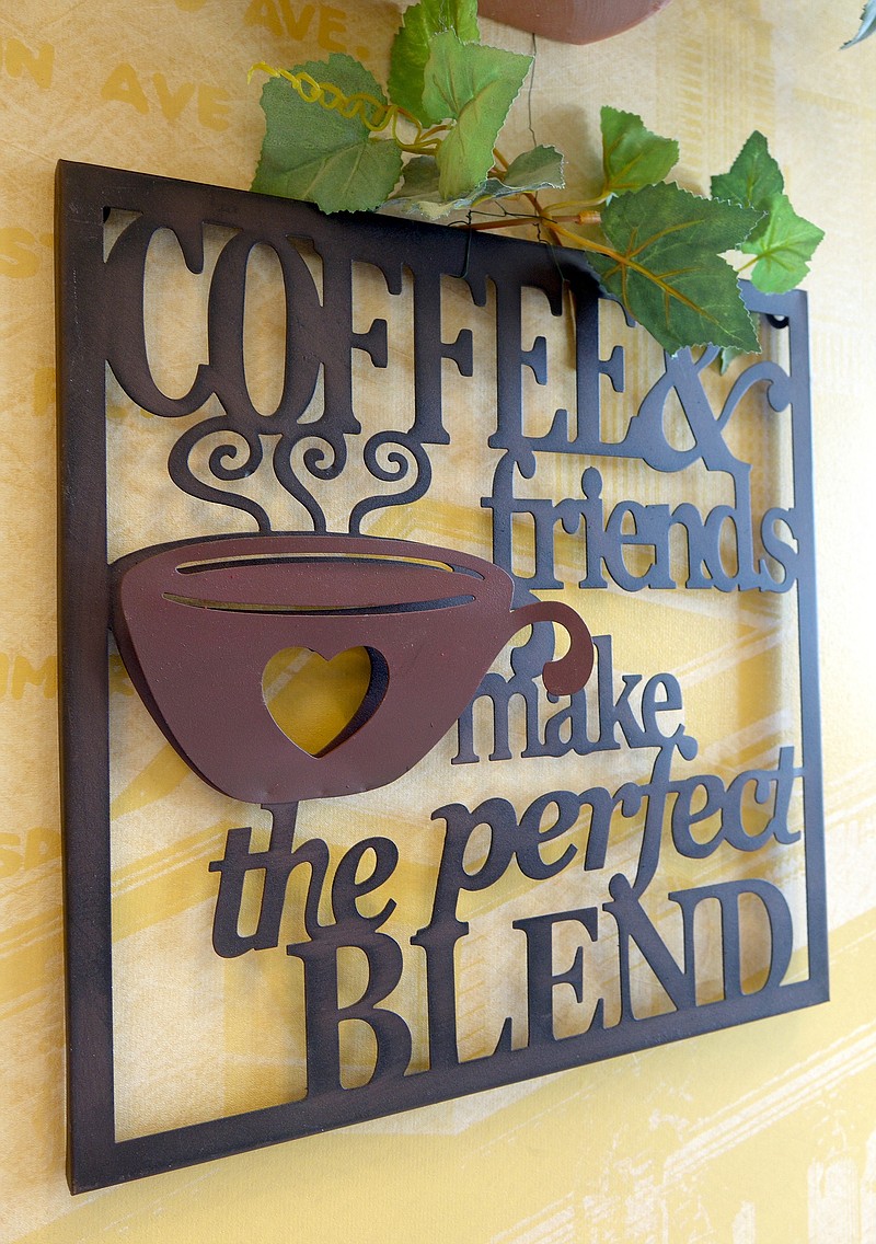 Coffee makes a lot of friends, the sign says.