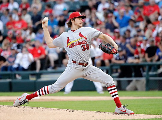 Cardinals starting pitcher Miles Mikolas delivers a pitch during Tuesday night's game against the White Sox in Chicago.