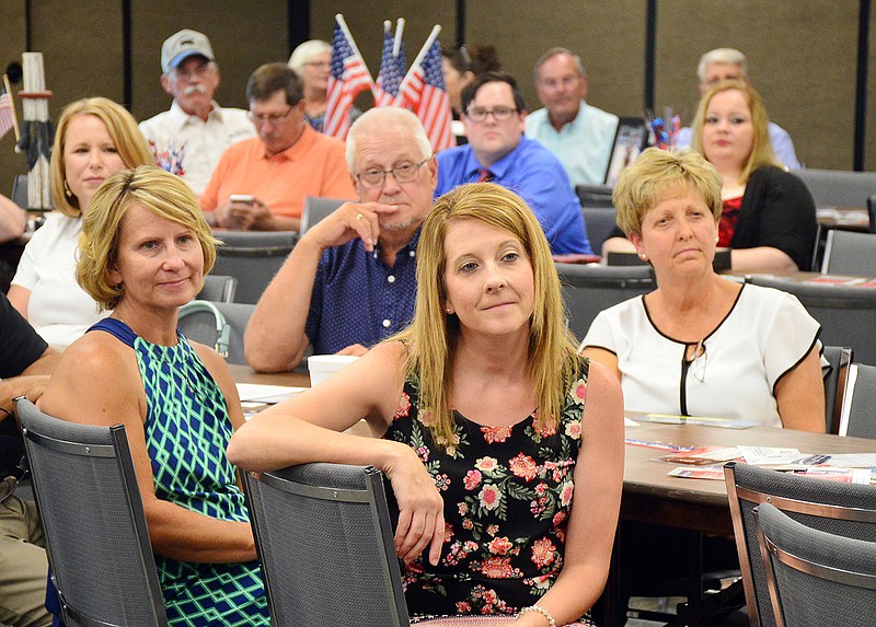 Members of the community listen as candidates discuss issues during a candidates forum Thursday evening at the Missouri Farm Bureau. The event was hosted by the Cole County chapter of the Missouri Farm Bureau.