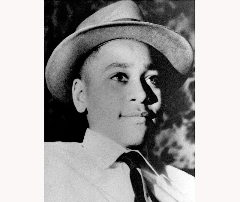 FILE - This undated photo shows Emmett Louis Till, a 14-year-old black Chicago boy, who was kidnapped, tortured and murdered in 1955 after he allegedly whistled at a white woman in Mississippi. The federal government has reopened its investigation into the slaying of Till, the black teenager whose brutal killing in Mississippi helped inspire the civil rights movement more than 60 years ago. (AP Photo, File)