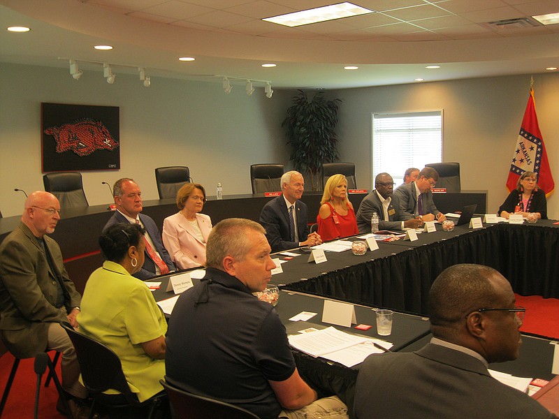 Arkansas Gov. Asa Hutchinson listens to Texarkana, Ark., School District officials as well as both Fouke and Genoa School Districts officials regarding school safety measures and teacher recruitment and retention ideas during a visit to Texarkana Friday. Hutchison said his visit will be just one of more to come.
