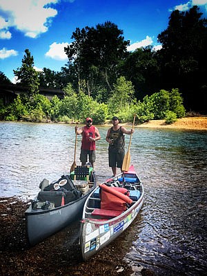 Brandon Butler and Derek Butler at the end of a 35-mile float trip on the Current River.