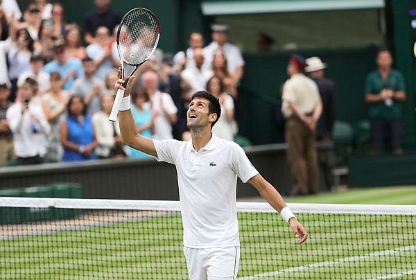 Novak Djokovic celebrates defeating Rafael Nadal during Saturday's men's singles semifinals match at the Wimbledon Championships London.