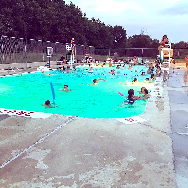 <p>Courtesy of Jenifer Seaver</p><p>After reopening following major repairs, the Russellville Pool held a Swimming Under the Stars event July 14.</p>