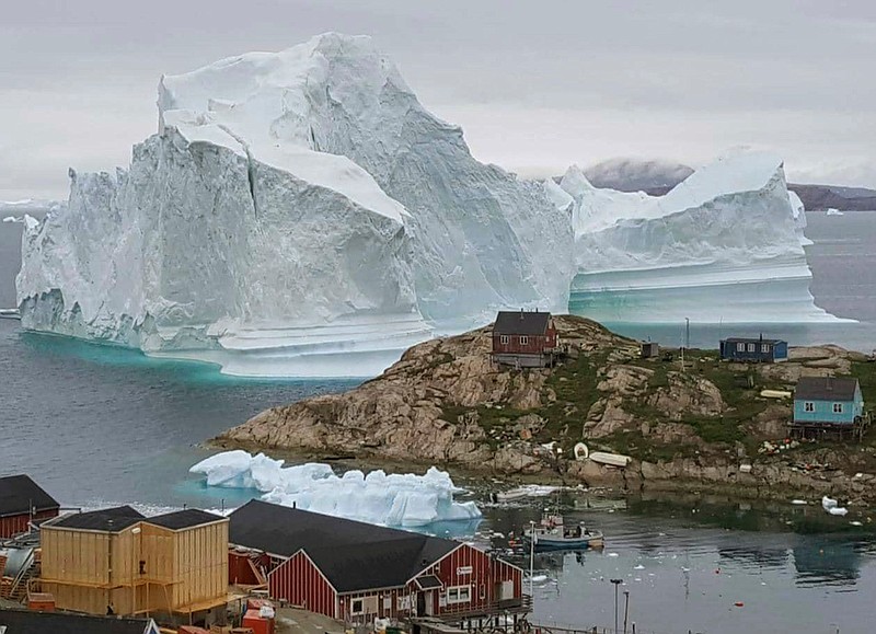 An iceberg is seen Thursday near the village of Innarsuit on the northwestern coast of Greenland. 