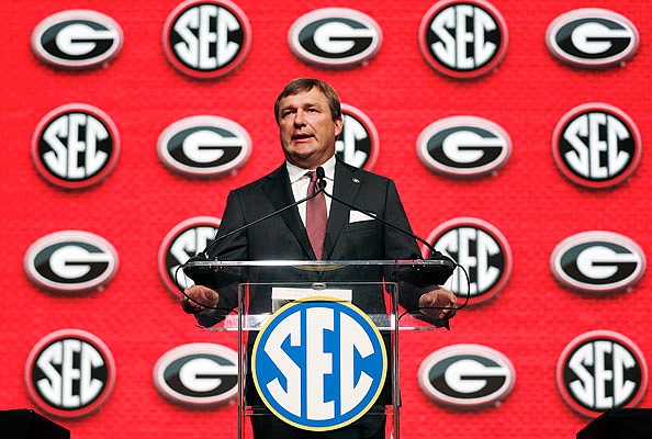 Georgia coach Kirby Smart speaks Tuesday during Southeastern Conference Media Days in Atlanta.