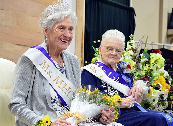 Dalphene Trout, left, a resident of Oak Tree Villas in Jefferson City, takes home the winner's crown Thursday during the Missouri Health Care Association's Ms. Nursing Home Pageant at Capital West Christian Church. Seated next to her is Patricia Thomas of Lakeside Meadows who was named first runner up. 