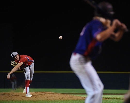 Jefferson City Post 5 pitcher Skyler Dickneite works to the plate during Thursday night's zone tournament game against Washington Post 218 at the American Legion Post 5 Sports Complex.