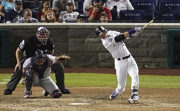 Colorado Rockies shortstop Trevor Story (27) hits a solo home run in the seventh inning during the 89th MLB baseball All-Star Game, Tuesday, July 17, 2018, at Nationals Park, in Washington.