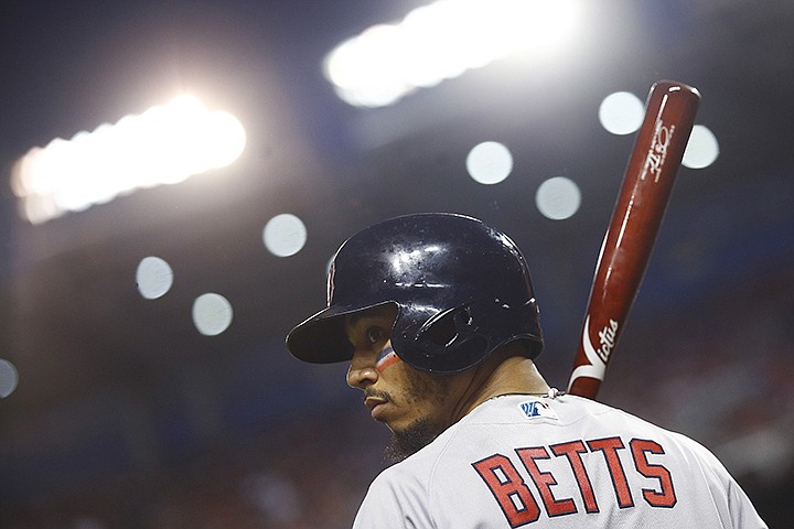 Boston Red Sox outfielder Mookie Betts (50) looks across the field during the first inning of the Major League Baseball All-star Game, Tuesday, July 17, 2018 in Washington.