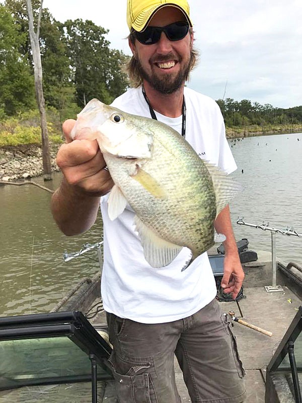 Fishing guide Jeff Faulkenberry shows off a crappie he caught on Truman Lake.