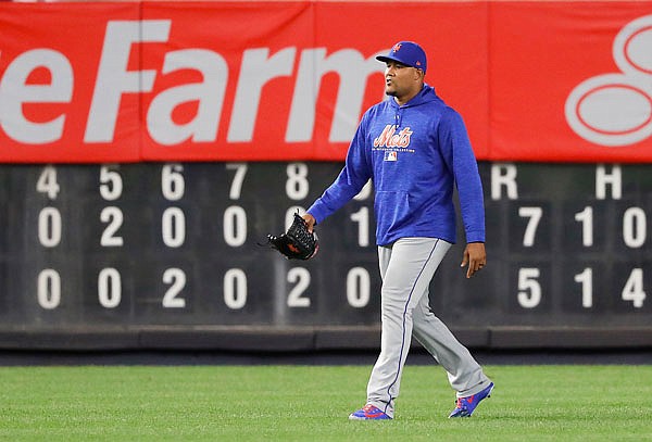 Mets relief pitcher Jeurys Familia walks across the field after Friday's game against the Yankees in New York.