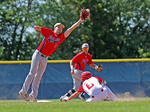 Jefferson City Post 5 Seniors second baseman Parker Schnieders reaches for the ball as Joe Bauer of Washington Post 218 slides into second base during Saturday's Zone 1 Tournament championship game at the American Legion Post 5 Sports Complex.