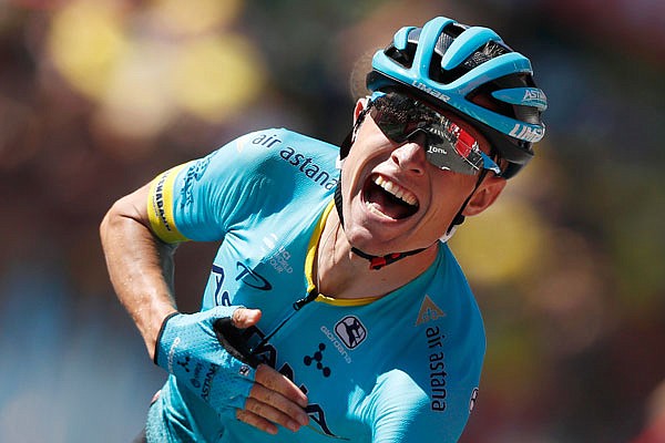 Magnus Cort Nielsen crosses the finish line Sunday to win the 15th stage of the Tour de France.