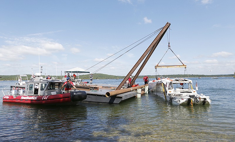The duck boat that sank in Table Rock Lake in Branson is raised Monday, July 23, 2018. The boat went down the previous Thursday evening, July 19, after a thunderstorm generated near-hurricane strength winds.