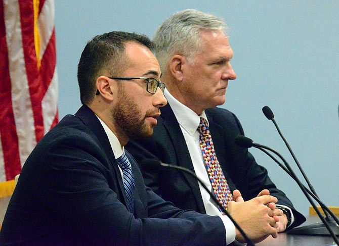 Cole County prosecuting attorney candidates Mark Richardson, right, and Locke Thompson square off Tuesday during the News Tribune-hosted candidate forum at City Hall.