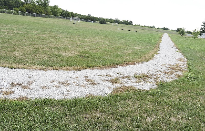 Julie Smith/News Tribune
The popularity of this walking track adjacent to Callaway Hills School in Holts Summit should increase with the addition of fitness equipment later this year. The gravel track, which as added in recent years,  was paid for by Healthy Schools, Healthy Communities.