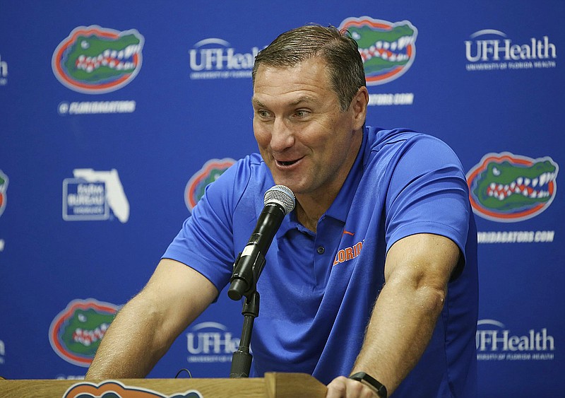 Florida NCAA college football head coach Dan Mullen speaks at a press conference in Gainesville, Fla., Thursday, Aug. 2, 2018. (Stephen M. Dowell/Orlando Sentinel via AP)