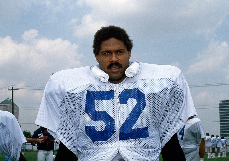 In this undated file photo Robert Brazile, linebacker for the Houston Oilers, poses for a photo. Though Brazile turned in his Dr. Doom persona decades ago for the role of Mr. Brazile, a special education teacher, he'll revisit the success of his first career on Saturday, Aug. 4, 2018 when he'll be one of eight men inducted into the Pro Football Hall of Fame. Brazile is part of a class which includes Bobby Beathard, Brian Dawkins, Jerry Kramer, Ray Lewis, Randy Moss, Brian Urlacher and Terrell Owens. (AP Photo, file)