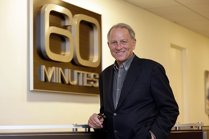 In a Tuesday, Sept. 12, 2017 file photo, "60 Minutes" Executive Producer Jeff Fager poses for a photo at the "60 Minutes" offices, in New York. Fager is delaying his return from vacation until a probe into sexual misconduct claims wraps up. CBS hired two outside law firms to investigate CEO Les Moonves after a New Yorker article published claims of sexual misconduct from six women spanning three decades. The article also contained allegations of inappropriate behavior by Fager. Fager has denied any wrongdoing. (AP Photo/Richard Drew, File)