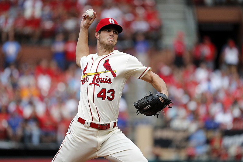 Cardinals pitcher Dakota Hudson throws in relief during the seventh inning of a game against the Cubs on July 28, 2018, in St. Louis. 