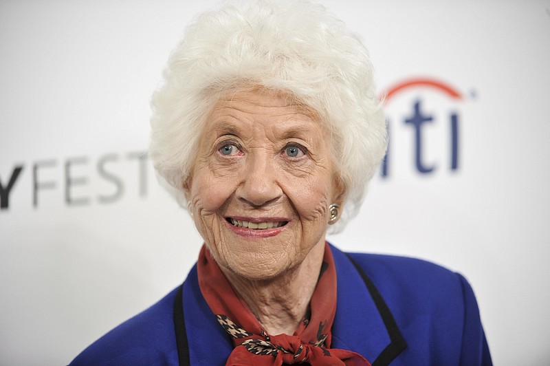 FILE- In this Sept. 15, 2014 file photo, Charlotte Rae arrives at the 2014 PALEYFEST Fall TV Previews - "The Facts of Life" Reunion in Beverly Hills, Calif.   A spokesman for Rae, who played a wise and caring housemother to a brood of teenage girls on the long-running sitcom "The Facts of Life," says the actress has died. She was 92. Spokesman Harlan Boll said Rae died Sunday, Aug. 5, 2018, at her Los Angeles home. (Photo by Richard Shotwell/Invision/AP, File)