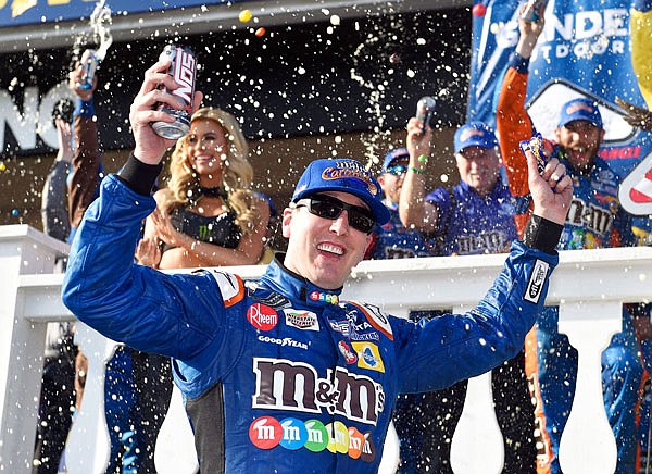 Kyle Busch celebrates in victory lane after winning a NASCAR Cup Series race last month in Long Pond, Pa.
