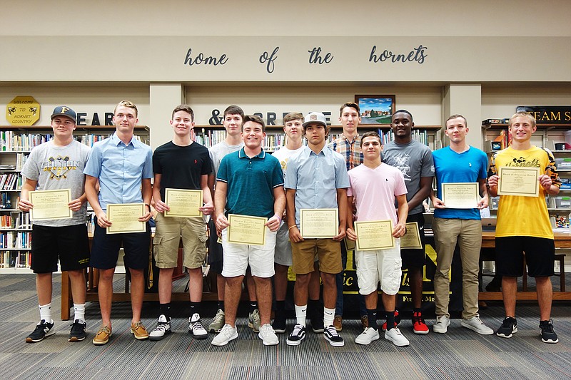 <p>Helen Wilbers/For the News Tribune</p><p>Members of the Fulton Hornets baseball team were recognized at Wednesday evening’s Board of Education meeting for earning the Academic All-State distinction with the Missouri High School Baseball Coaches Association. The team had an average GPA of 3.32.</p>