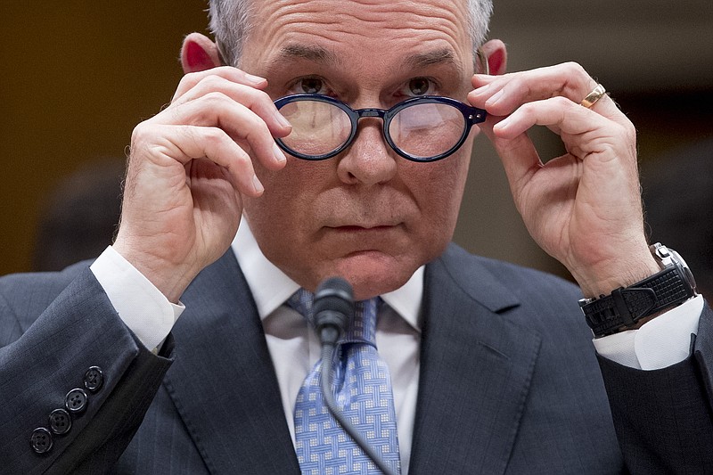 FILE - In this May 16, 2018 file photo, Environmental Protection Agency Administrator Scott Pruitt appears before a Senate Appropriations subcommittee on budget on Capitol Hill in Washington. A federal appeals court has ruled that the Trump administration endangered public health by keeping a top-selling pesticide chlorpyrifos on the market, despite extensive scientific evidence that even tiny levels of exposure could harm babies’ brains. The 9th U.S. Circuit Court of Appeals in San Francisco has ordered the Environmental Protection Agency to remove chlorpyrifos from sale in the United States within 60 days.  (AP Photo/Andrew Harnik)