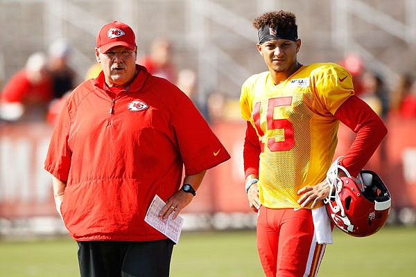 In this Thursday, Aug. 2 file photo, Chiefs quarterback Patrick Mahomes II and head coach Andy Reid talk during training camp in St. Joseph.