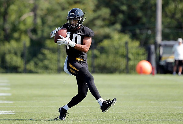Missouri wide receiver Alex Ofodile catches a pass during practice earlier this month in Columbia.