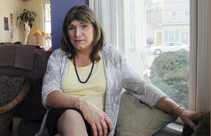 File - In this Feb. 21, 2018 file photo, transgender utility executive Christine Hallquist poses for a photo during an interview in Johnson, Vt. Hallquist is one of four Democrats seeking the party's nomination for Vermont governor in the Tuesday, Aug. 14 primary election. (AP Photo/Wilson Ring, File)