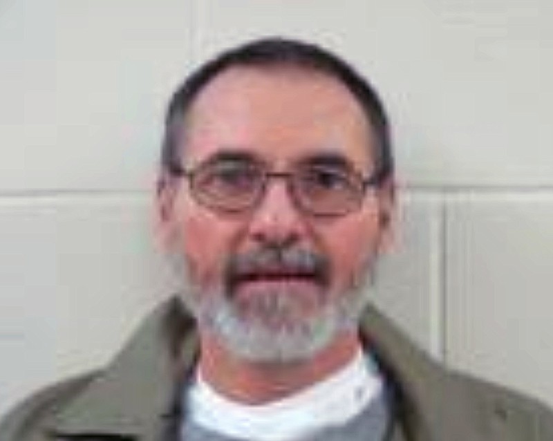 This photo provided by the Nebraska Department of Correctional Services shows Jeff Boppre, who is serving two consecutive life sentences for the fatal 1988 shootings of two people in western Nebraska. Boppre is seeking to reopen the case by using new technology to identify fingerprints left at the crime scene. He has maintained his innocence for 30 years and believes he was framed. His request for courts to take another look at his case comes as a new documentary nearing completion calls into question his guilt. (Nebraska Department of Correctional Services via AP)