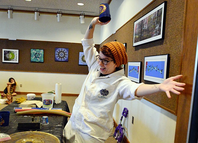 Emily Crawford, aka "Electric Emily," performed science tricks for the children and adults attending the Mad Science of St. Louis "Sounds Like Science" show Saturday at the Missouri River Regional Library. Youth who finished the summer reading program were able to celebrate their accomplishment by attending the event.