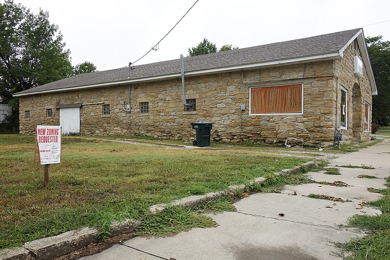 This former commercial building at 715 Nichols St. in Fulton is under consideration for rezoning. It is owned by Court Street United Methodist Church along with a lot to the south and is listed for $89,900 by Garriott and Associates Realty.