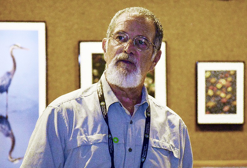 Gary Leabman
Mark Wilson/News Tribune
Gary Leabman, who has worked with Nobel Prize Laureates, discusses the climate crisis at the Missouri River Regional Library Tuesday.