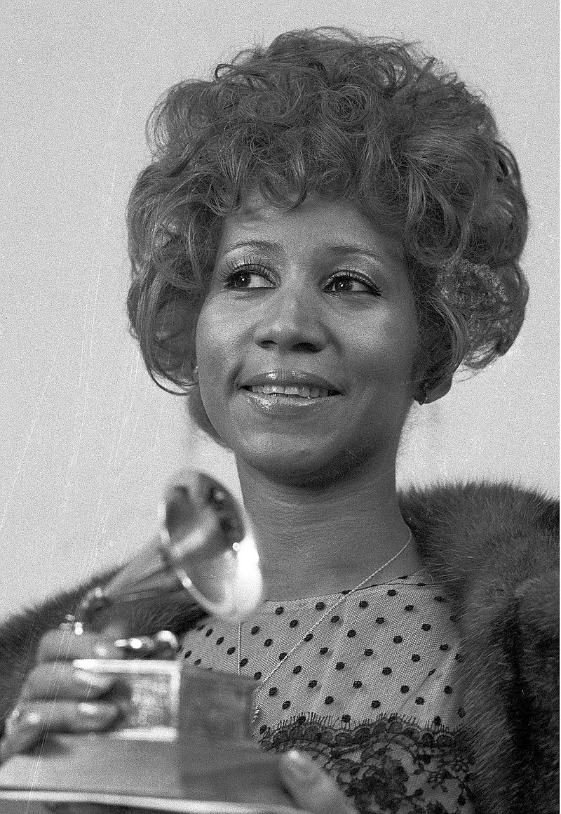 In this March 13, 1972 file photo, Aretha Franklin holds her Grammy Award for Best Rhythm and Blue performance of the song "Bridge Over Troubled Waters," in New York. Franklin died Thursday, Aug. 16, 2018 at her home in Detroit. She was 76. (AP Photo/Dave Pickoff, File)