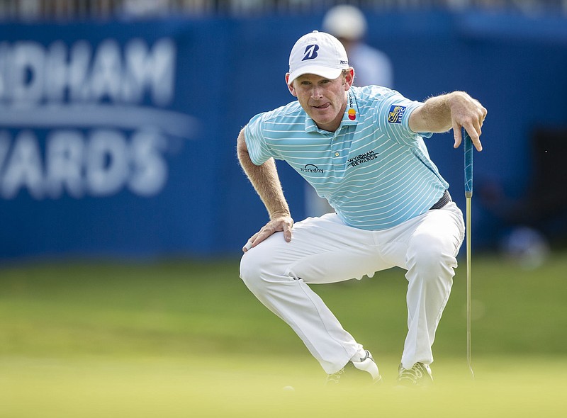 Brandt Snedeker lines up his putt on the 15th hole during the second round of the Wyndham Championship golf tournament at Sedgefield Country Club in Greensboro, N.C., Friday, Aug. 17, 2018. (Khadejeh Nikouyeh/News & Record via AP)