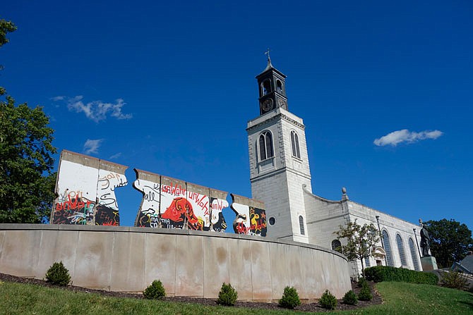 The Break-Through sculpture incorporating panels from the Berlin Wall and the National Churchill Museum are seen on the campus of Westminster College in Fulton. The college is hosting the upcoming Hancock Symposium, based on the theme of creative thought and invention.