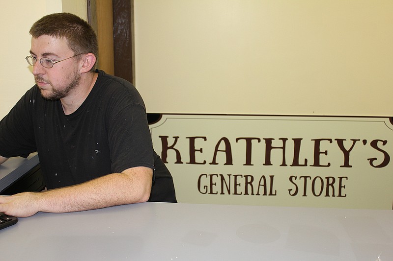 Keith Keathley keeps digital records as Keathley's General Store prepares for a September 2018 opening.